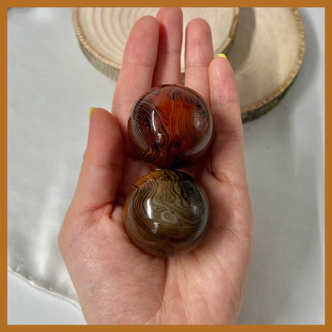 Two Madagascar Sardonyx Hand Massaging Balls (sold as set)